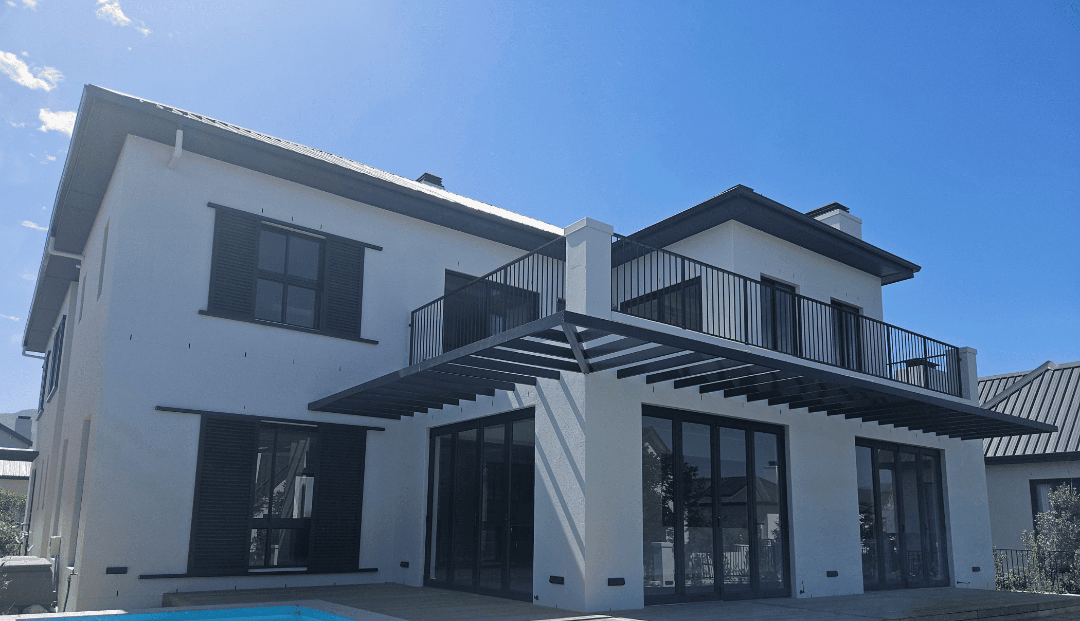 Black aluminium windows installed on modern residential property