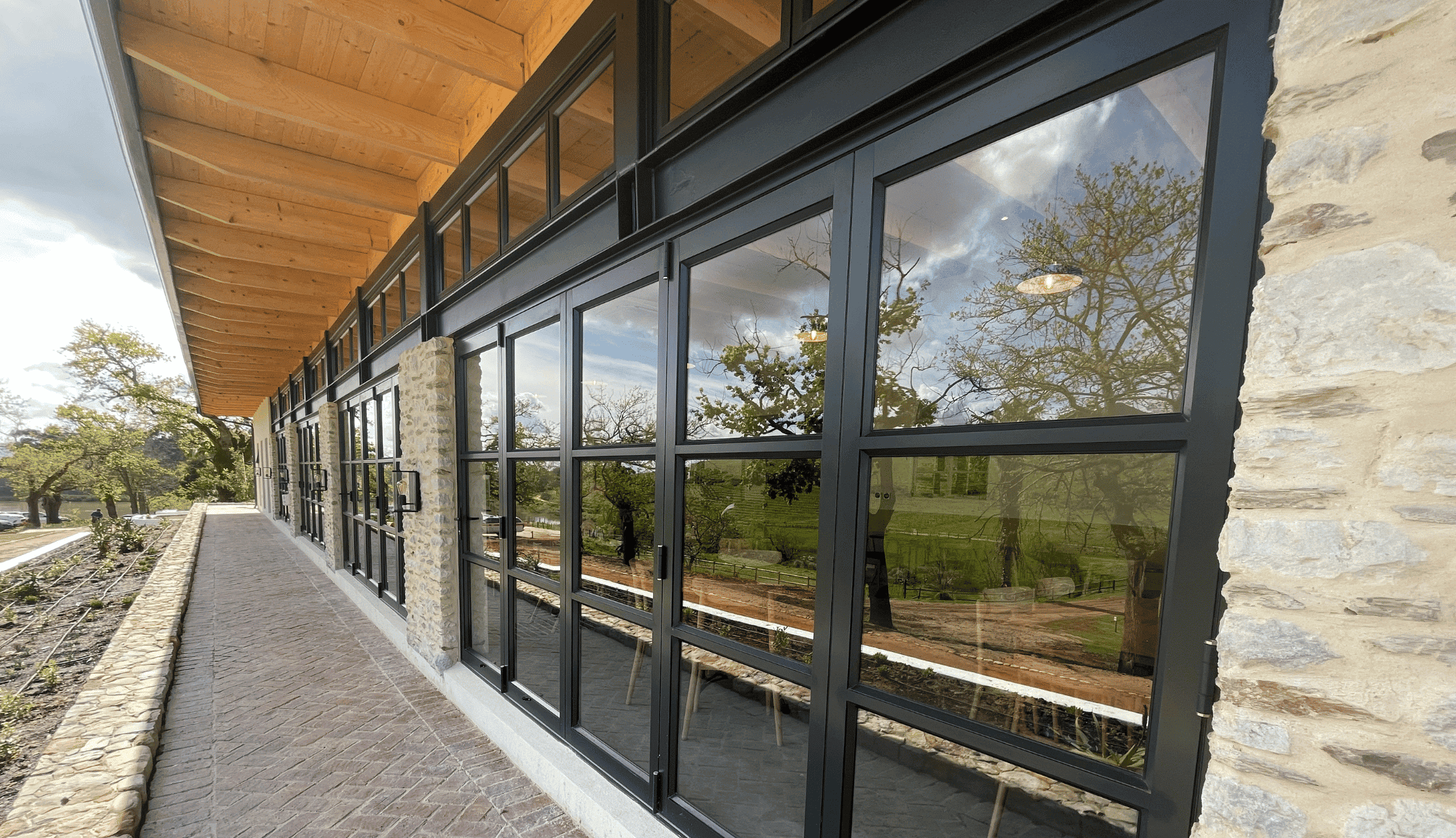 Black aluminium windows installed on modern residential property
